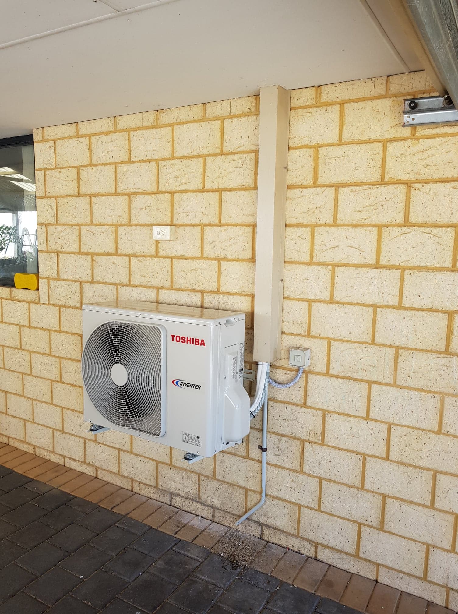 Completed outdoor air-conditioning unit installation